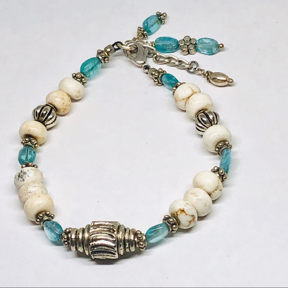 Silver tone bracelet with glass and stones